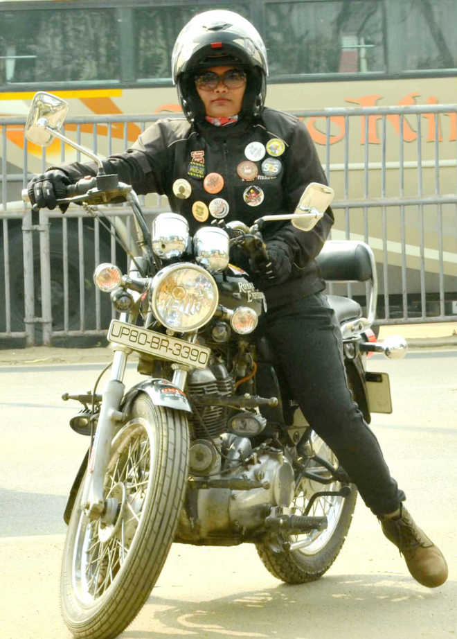 Road safety woman biker’s mission