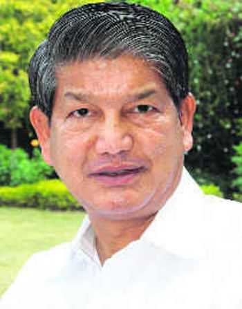 Ex-CM Rawat booked in horse-trading case