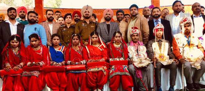 12 couples tie knot at mass wedding at Chhapar village