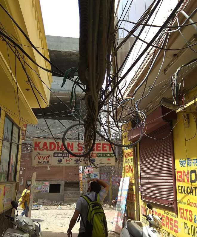 Electricity wires dangle dangerously as officials turn a blind eye