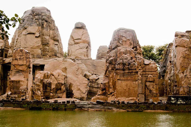 Rock-cut temples in Masrur turning into ruins