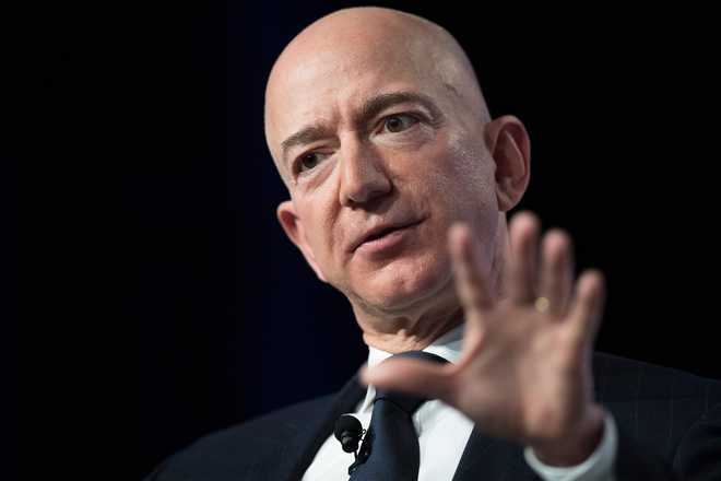 Lawyer denies tabloid blackmailed Amazon boss Bezos
