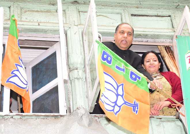 CM hoists BJP flags on party worker’s house