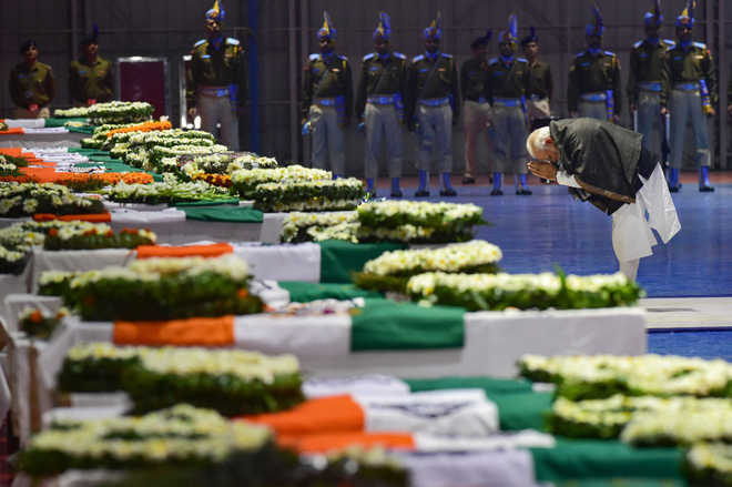 IAF plane brings bodies of slain CRPF men to Delhi; leaders pay last respects