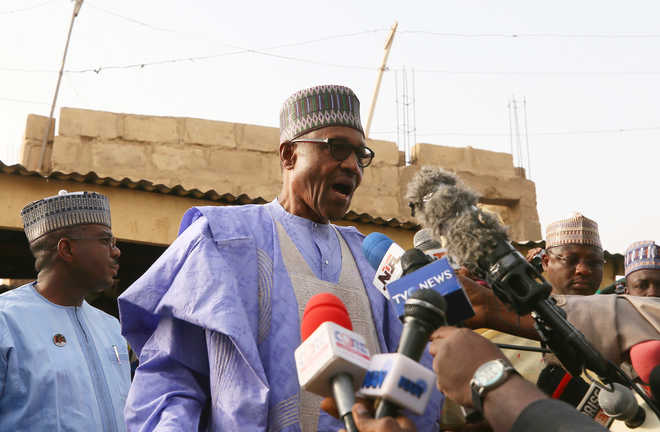 Gunfire heard in cities as Nigerians finally go to the polls
