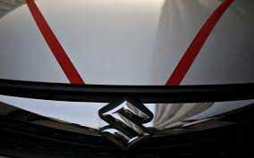 Maruti cuts output by over 8%