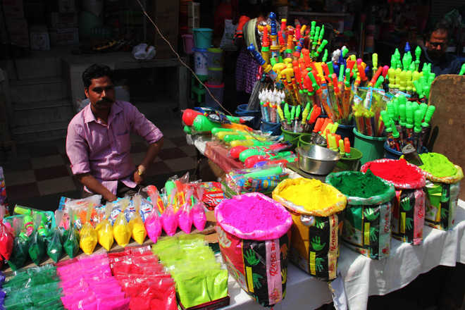 Ahead of Holi, markets decked up with colours