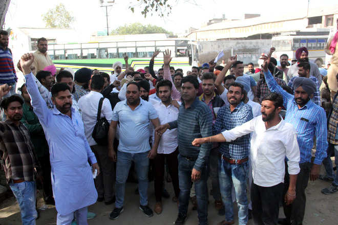 PRTC employees stage protest at city bus stand