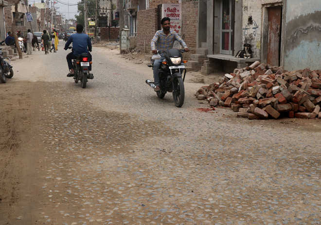 Residents suffer as road repair lacking in Parasram Nagar