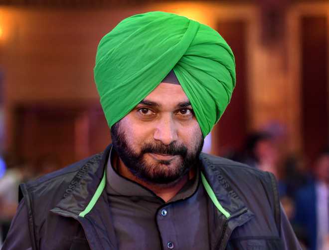 Not sulking, says Sidhu as he returns from ‘self-imposed exile’ : The ...