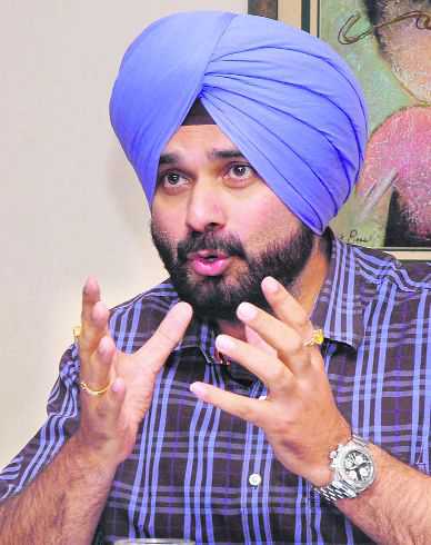 Sidhu back from ‘self-exile’ : The Tribune India