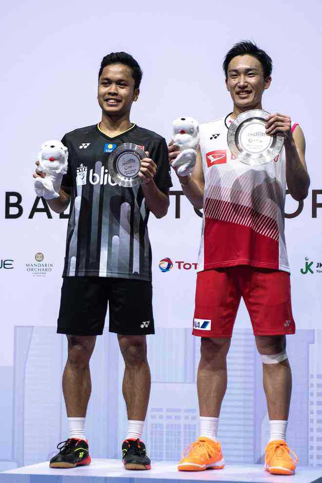 Momota, Tai win Singapore titles