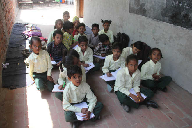 Pupils attend classes in open at Sanjay Nagar govt school