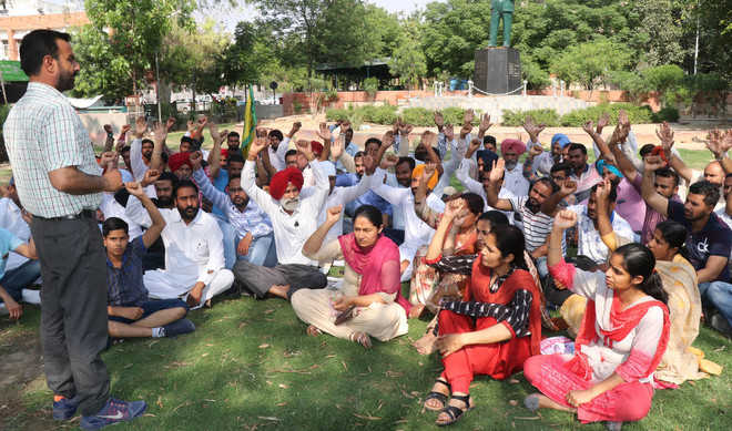 Teachers protest, seek arrest of accused in assault case