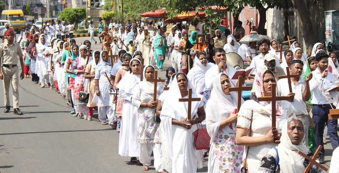 Procession marks Good Friday in city