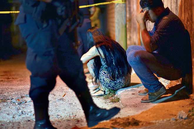 Unidentified gunmen kill 13 at Mexican party