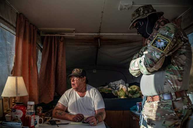US arrests rightwing militia member said to detain migrants