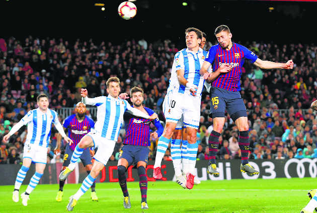 Barca on brink after tight win