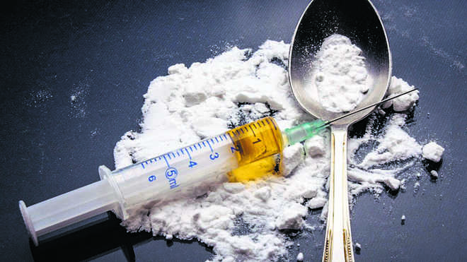 Nepal resident held with 18-gm heroin