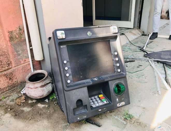 Miscreants uproot ATM, fail to break it