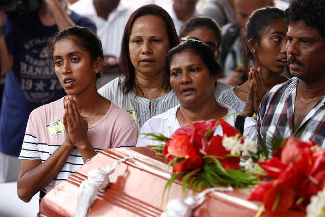 Sri Lanka observes 3-minute silence as death toll rises to 310 in Easter Sunday attacks