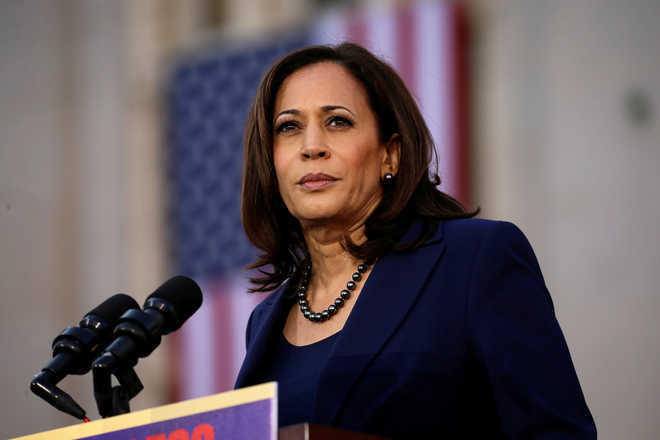 Harris faces calls to prove her commitment to New Hampshire voters