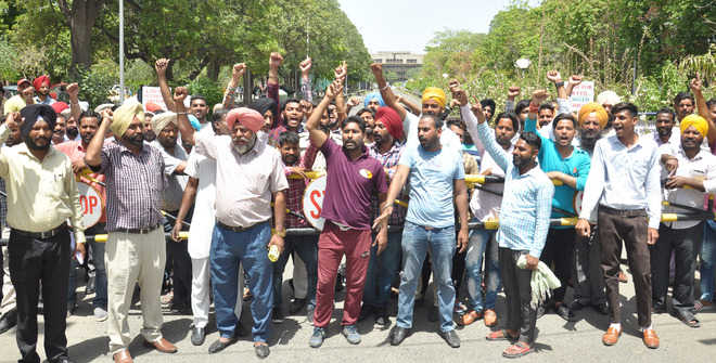 GNDU outsourced staff protest for regular jobs