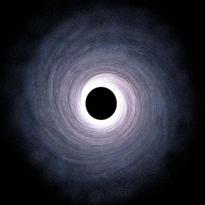 Plasma-spewing black hole dragging spacetime : The Tribune India