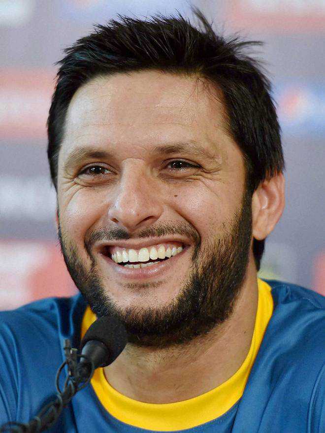 Shahid Afridi. IN Boys Hairstyle.....