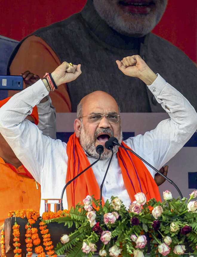 Vote for BJP as it defended nation against terror: Shah