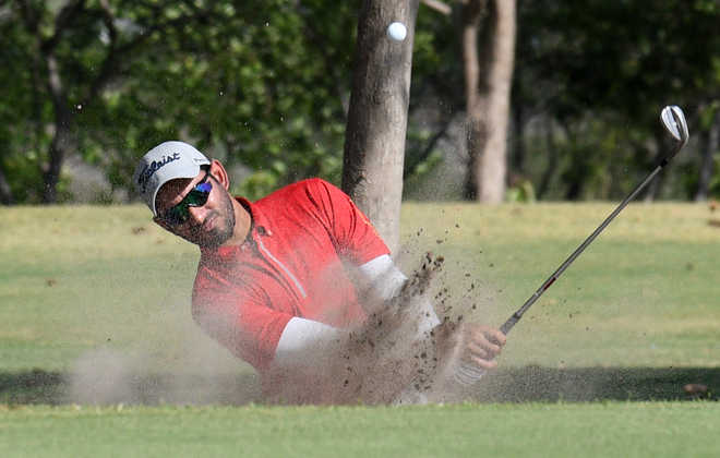 Angad in lead, Yuvraj jumps to second spot on Day 2