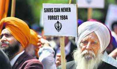 1984 riots issue revived, Cong wary