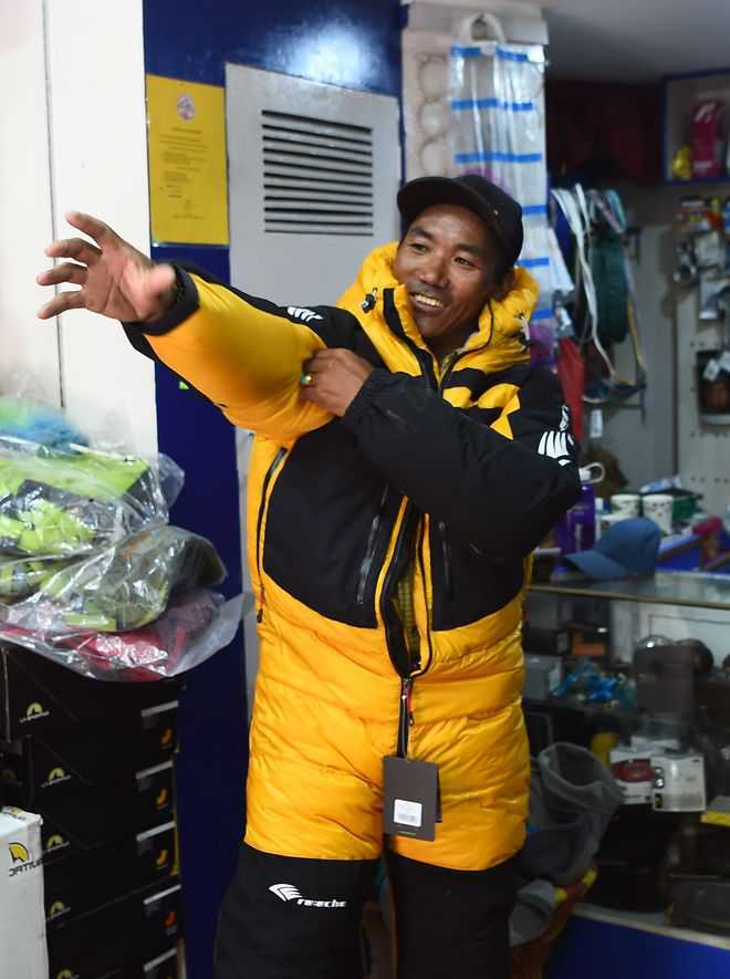 Sherpa climbs Everest for record 23rd time