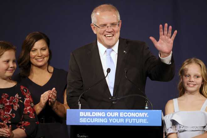 Australia election: Defying exit polls, PM Morrison-led coalition heads toward majority