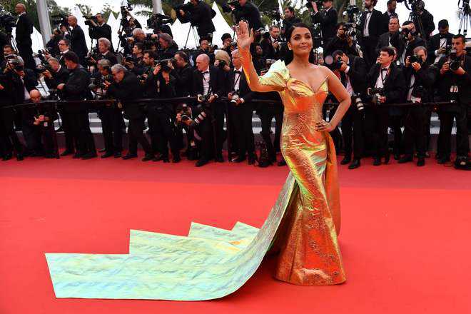 Aishwarya Rai's Stunning Golden Gown with Black Blazer