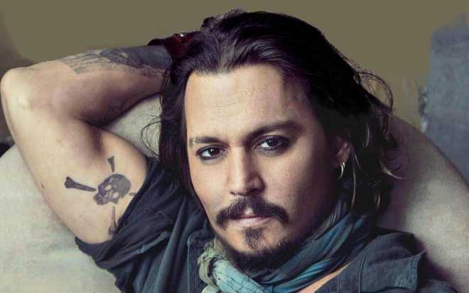 Johnny Depp hit with USD 350,000 lawsuit over unpaid legal bill