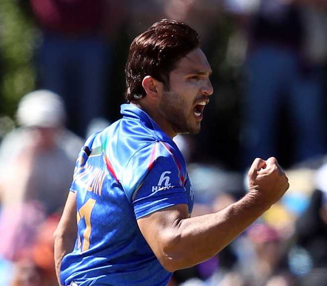 Shahzad  ton, Naib 6-for in Afghan win