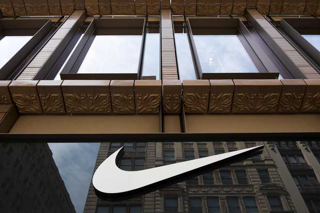 Nike, Adidas urge Trump to end trade war