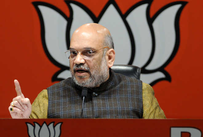 Rattled by likely defeat, opposition questioning EVMs: Shah