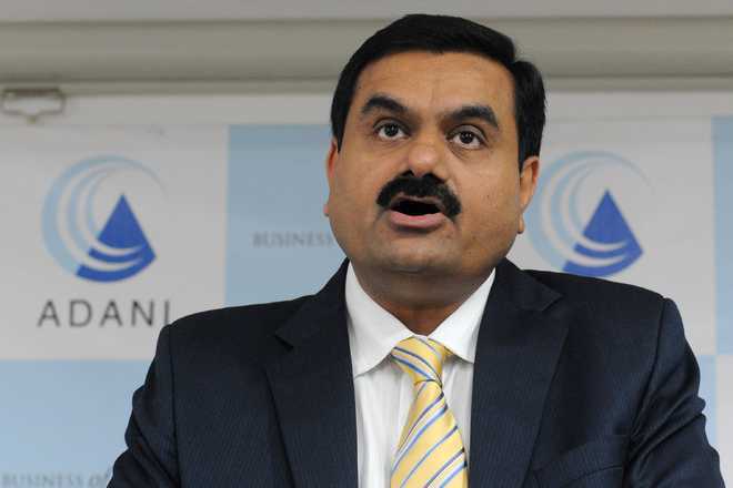 Adani Group to withdraw defamation cases against ''The Wire''