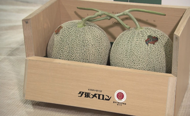 Two melons auctioned for record $45,600 in Japan