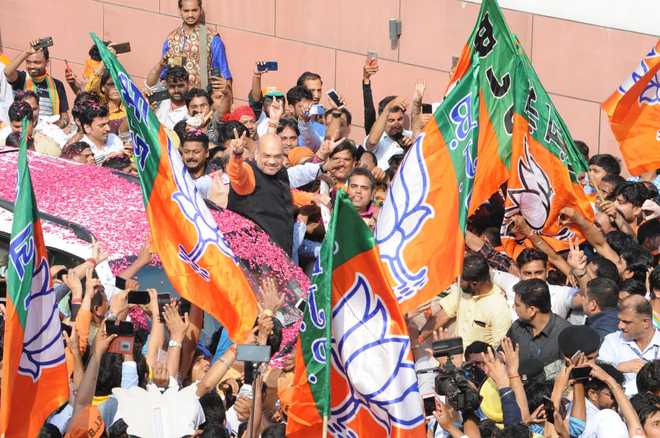BJP crosses 300-mark; Congress bags 52 as counting ends