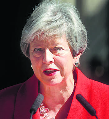 Brexit-beaten PM May to step down on June 7