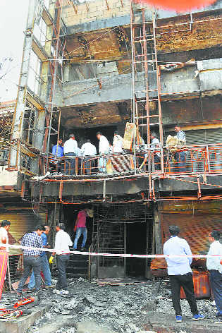 Surat coaching centre owner, 2 builders held