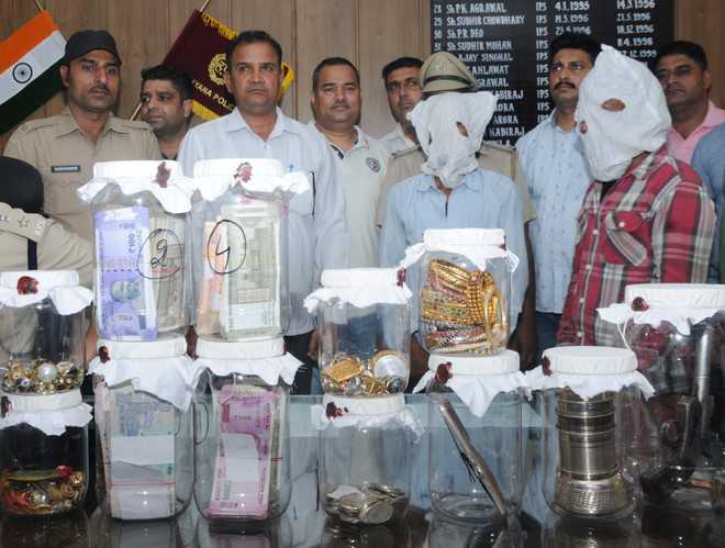 Rs 1-cr robbery cracked, two arrested