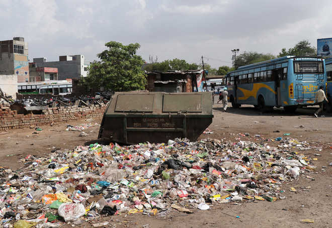 Waste, open defecation a blot on city bus stand