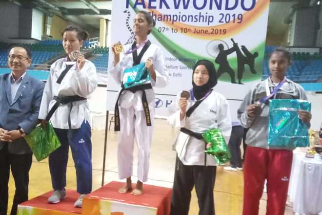 Kargil players clinch medals in taekwondo