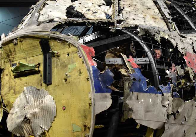 4 charged with downing MH17