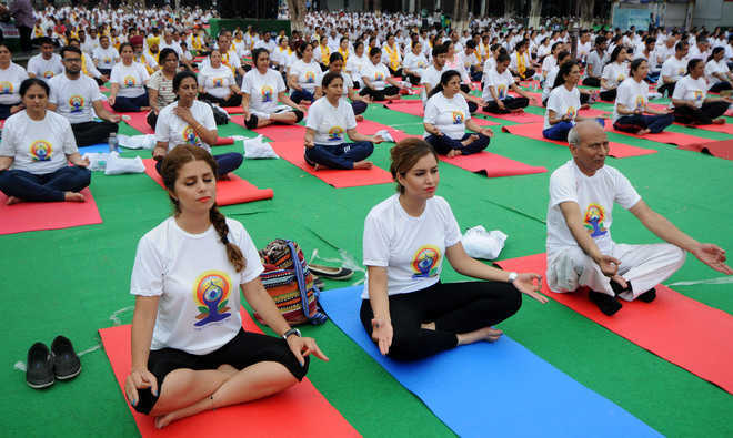 BJP invites Kejri, Sheila to yoga event