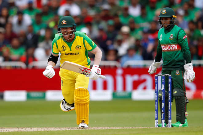 Warner takes Australia closer to World Cup semifinals